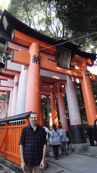 selfie in front of the start of the tunnel of torii gates